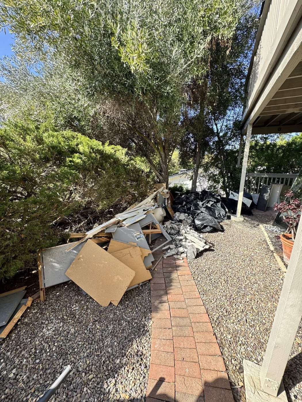 Before: Side Yard Construction Debris