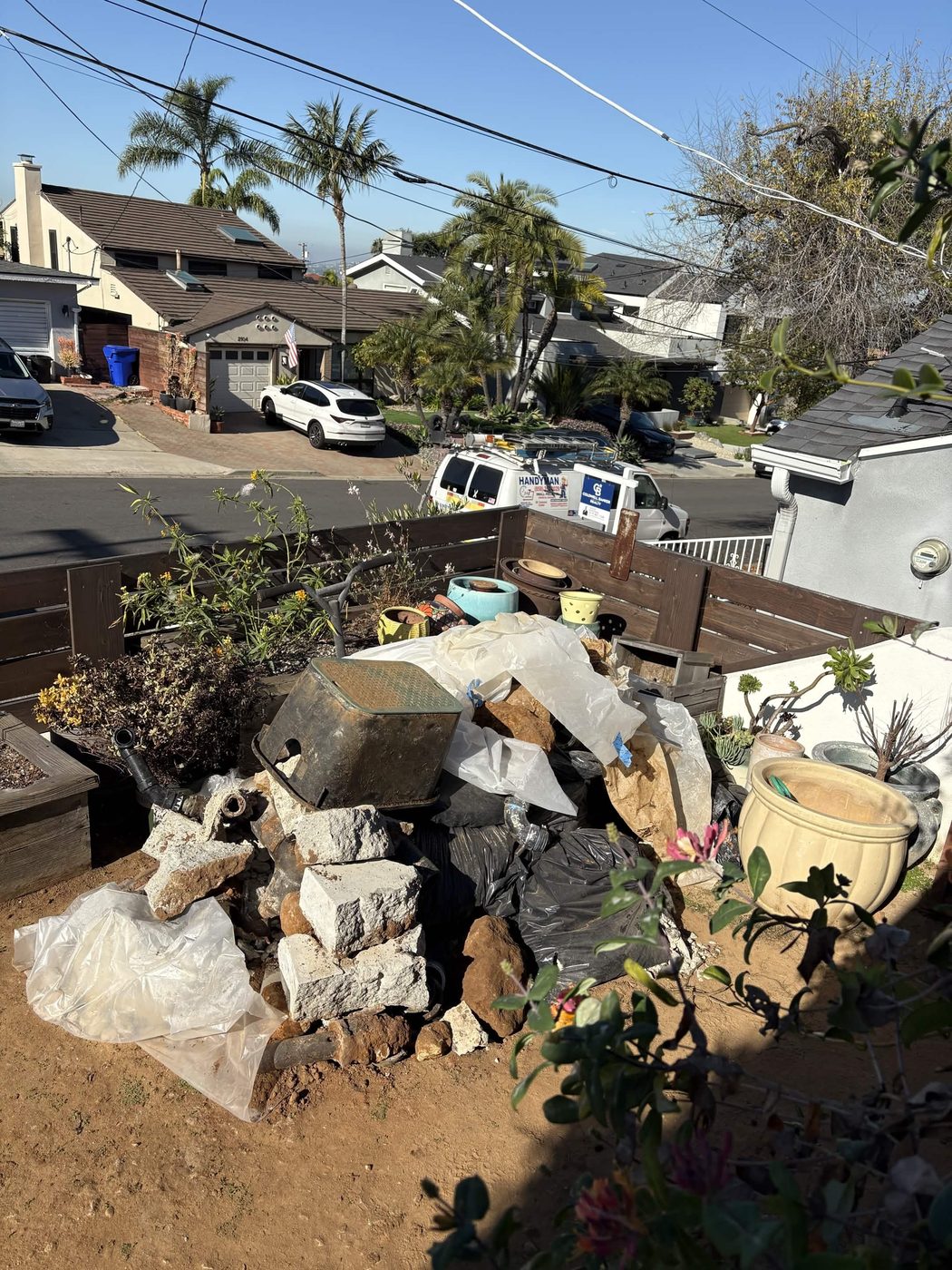 Before: Side Yard Rocks + Concrete